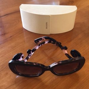 Prada sunglasses. New. Never worn. W box.